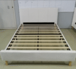 Cama de couro minimalista italiana avançada com cama de estrutura de aço de pé alto quarto principal cama dupla macia atmosférica de ponta